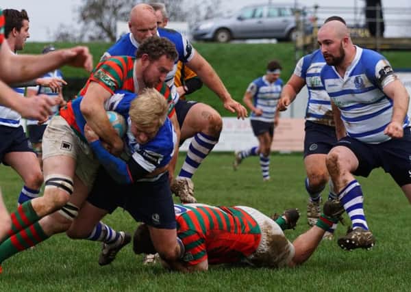 Try-scorer Ben Chamberlin makes a challenge on a freezing day in Northants EMN-180319-121957002