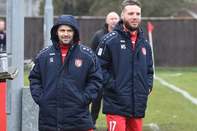 Stones, right, and assistant Steve Lovett.