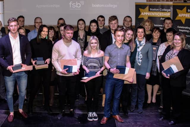 Some of the award-winning Boston College apprentices and employers. Image supplied