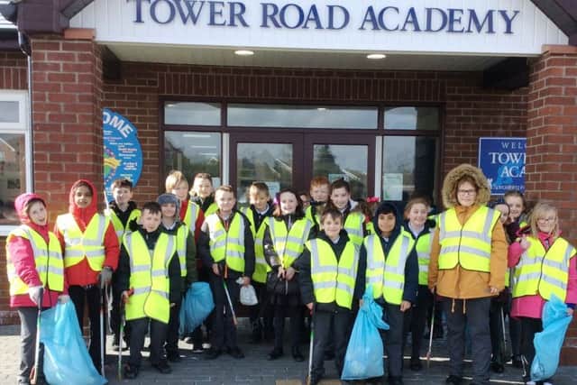 Litter pickers from Tower Road Academy.