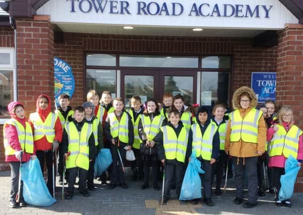 Litter pickers from Tower Road Academy.