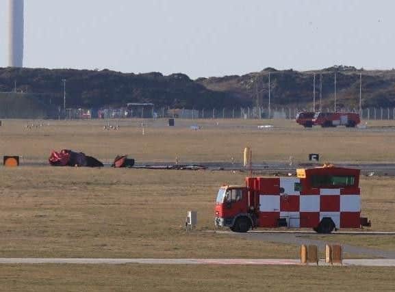 Wreckage after a Red Arrow jet crashed at RAF Valley in north Wales (Peter Byrne/PA)