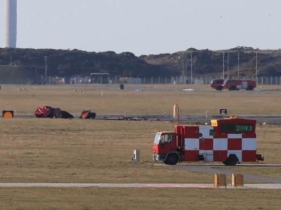 Wreckage after a Red Arrow jet crashed at RAF Valley in north Wales (Peter Byrne/PA)