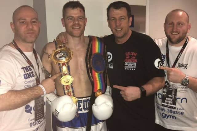 Callum Johnson with coach Joe Gallagher (second right) and his team. ZV13TAMPviYgQnBY16l5