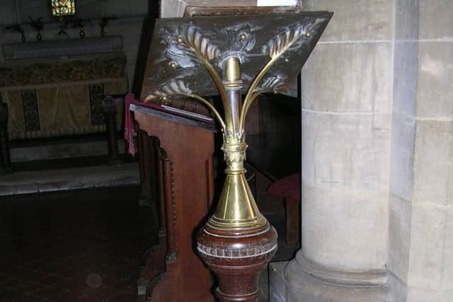 Stolen - the brass lectern taken from St Lucia's Church. EMN-180322-121720001