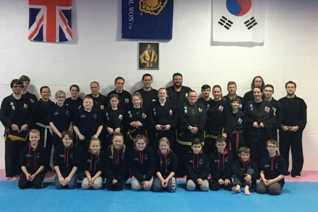 Pictured are the Scouts with Kuk Sool Won members at their purpose-built Marsh Lane centre.