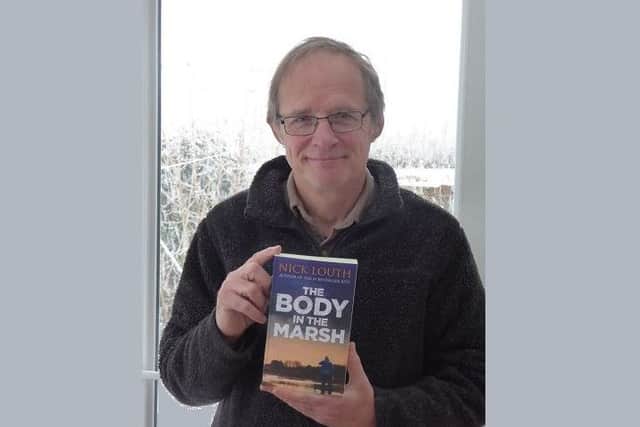 Nick Louth with his new book, 'The Body in the Marsh'.