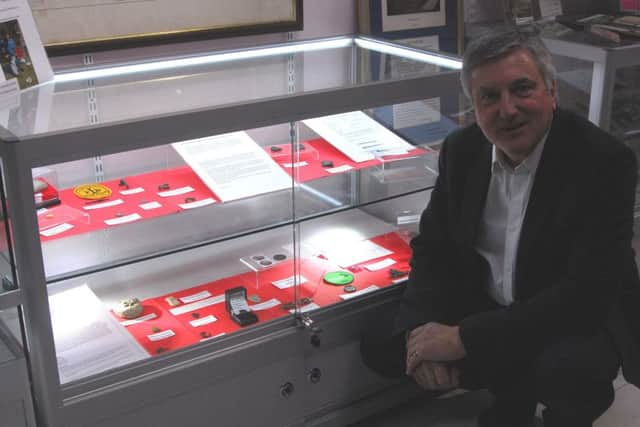 Detectorist Ray Hilliard and some of his local finds on show at Sleaford Museum. EMN-180323-145148001