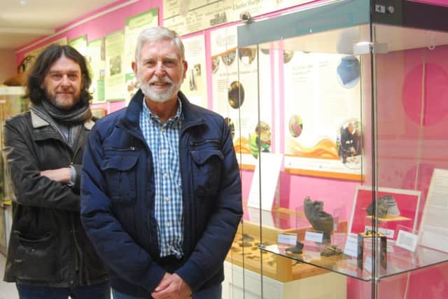 From left - chairman of Old Sleaford Heritage Group Dale Trimble with committee member James Robertson and their collection of artefacts on display at Sleaford Museum. EMN-180323-145226001