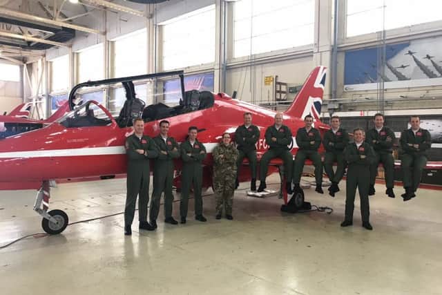 Sleaford MP Dr Caroline Johnson with the Red Arrows team at RAF Scampton. Flt Lt David Stark, the pilot involved in the crash at Anglesey, is pictured fifth from the right. EMN-180323-154903001