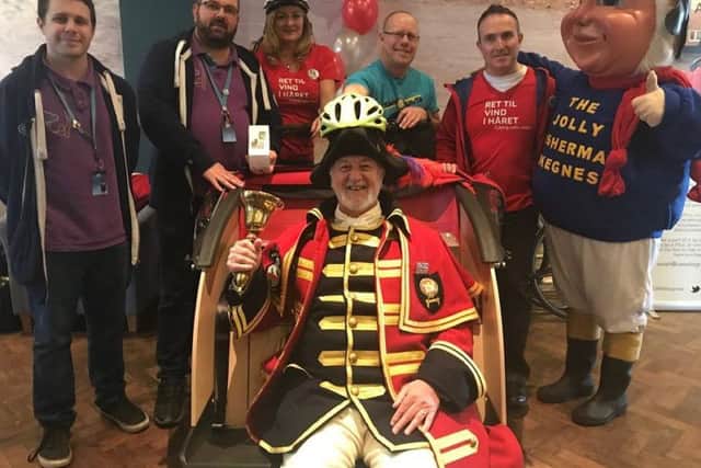 Volunteers and supporters at the launch of the trishaw in Skegness. ANL-180323-162312001