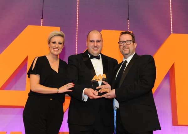 Pictured (from left) awards host Steph McGovern, of BBC News, Darren Bradford, and sponsor presenting Martin Peters, of Autoclenz Group.
