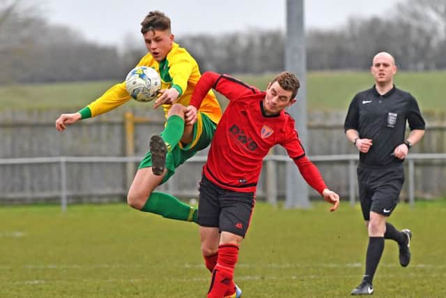 Geogre Hobbins (skeg) Nathan ThompsonSleaford Sports Amateurs (Red) v Skegness Town FC (Yellow)