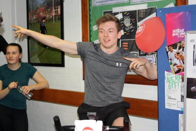 Adam Teskey celebrating the sixth form win EMN-180328-095145001