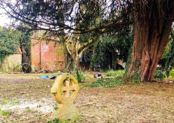 Sleaford Town Council staff have been busy clearing and tidying overgrown areas at the rear of the closed church yard to the rear of St Denys' Church. EMN-180330-160620001