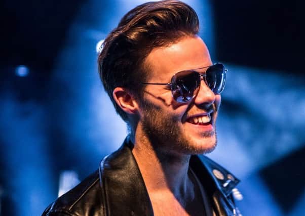 Craig Webb as George Michael in The Best of WHAM! at the Embassy Theatre. EMN-180331-113612001