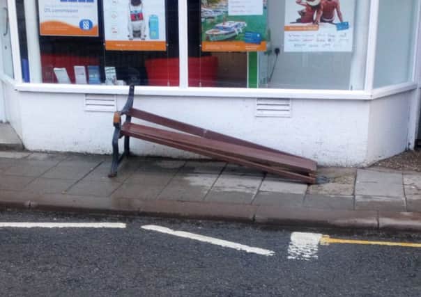 The vandalised seat, ripped out of the Market Place and dumped in Bridge Street.