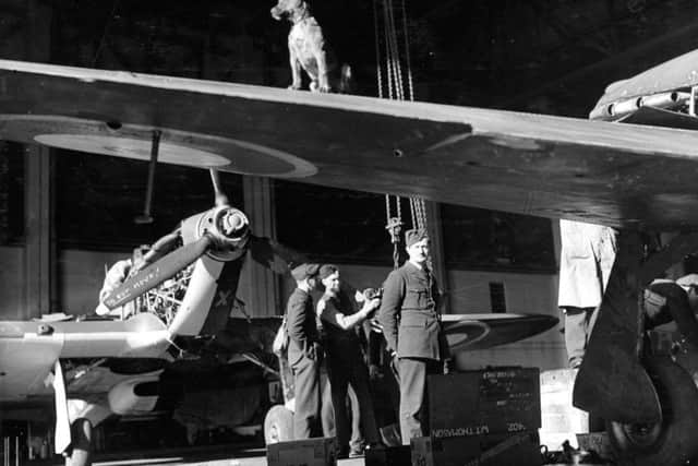 Hurricanes of 401 Squadron undergoing maintenance at Digby, 16 March 1941. EMN-180328-150858001