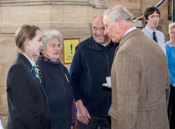 Bryony Curley meets Prince Charles on his visit to Holy Trinity Church, in Tattershall. Picture: John Aron. EMN-180330-111613001