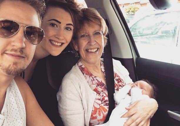 Alex Tilley pictured with sister Abi, mum Anne, and his son Oakley.