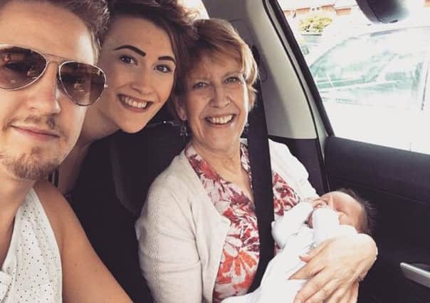 Alex Tilley pictured with sister Abi, mum Anne, and his son Oakley.