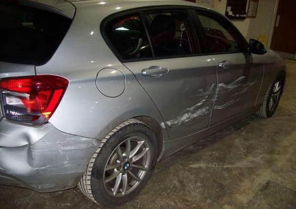 Bernadette Barber's battered BMW. EMN-180304-102959001