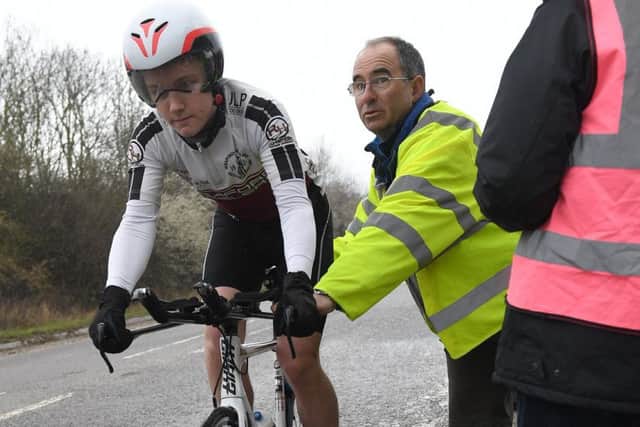 Sleaford Wheeler Thomas Howes is helped at the start line by Nigel Hurst. EMN-180304-102009002