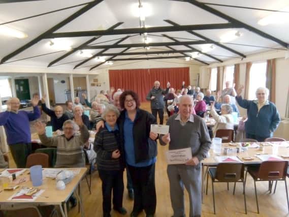 Joanne Pexton, representing Tattershall Co-operative Store, presented a cheque for ?649.98 to members of the Tattershall Luncheon club. EMN-180804-233426001