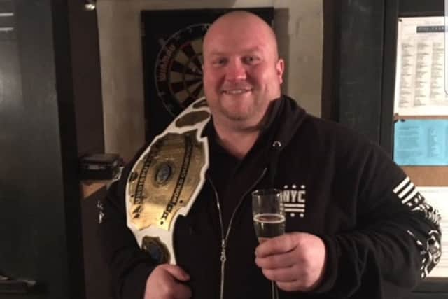 Broughton with his WAW belt.