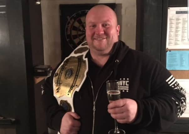 Broughton with his WAW belt.