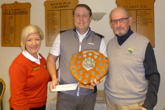 Men's winter series winner Paddy Kearn with Lady Captain Marlene Morris and Club Captain Barry Hunt.