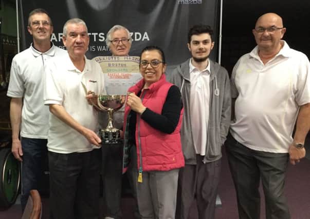 The quartet of Paul Flatters, David Gill and Andrew and Nathan Dunnington won Boston Indoor Bowls Club's Easter Tournament. The event, sponsored by the Mazda EMG Motor Group, was held on Easter Monday. The winners are pictured with club manager Tanya Brown.