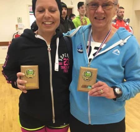 Zoe (left) and Debbie with their vet category prizes EMN-180904-125923002