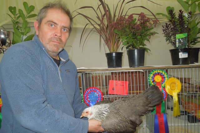 Ian Maguire, from Lincoln, won Best Rare Breed with his female Kraenkoppe. EMN-180904-142406001