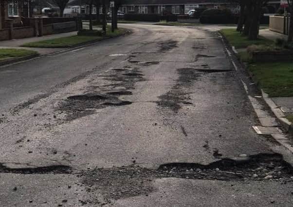 Potholes in Kennedy Avenue, that started a protest by Mayor of Skegness, Coun Danny Brookes. ANL-181004-092928001