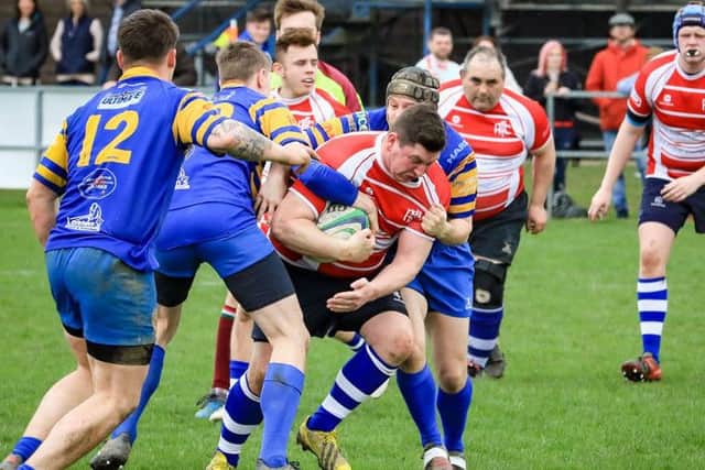 Steve Kippax is brought to a halt. Photo: David Dales.