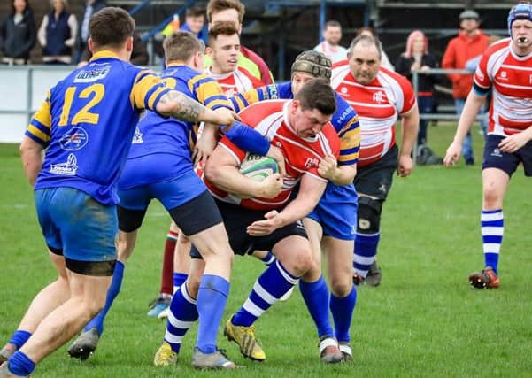 Steve Kippax is brought to a halt. Photo: David Dales.