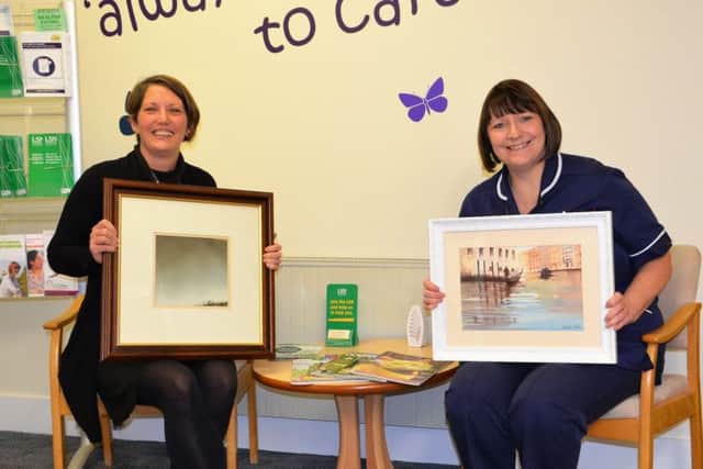 Lindsey Lodge Business Development Manager Kate Conway (left) and Senior Day Care Nurse Andrea Parker are pictured at the Hospice with pieces from the forthcoming Art Exhibition and Sale. EMN-181104-110217001