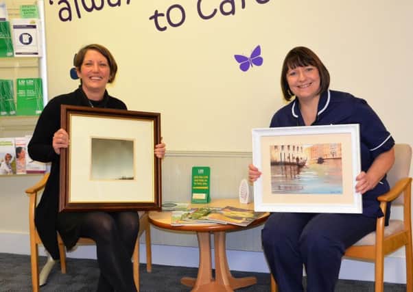 Lindsey Lodge Business Development Manager Kate Conway (left) and Senior Day Care Nurse Andrea Parker are pictured at the Hospice with pieces from the forthcoming Art Exhibition and Sale. EMN-181104-110217001