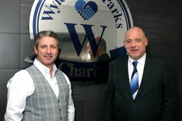 Wyldecrest Parks chairman Alfie Best (left) and Stuart Round, charitys manager (right). EMN-181104-105111001