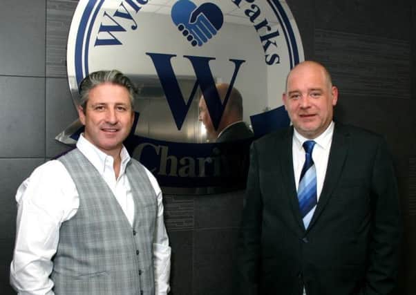 Wyldecrest Parks chairman Alfie Best (left) and Stuart Round, charitys manager (right). EMN-181104-105111001