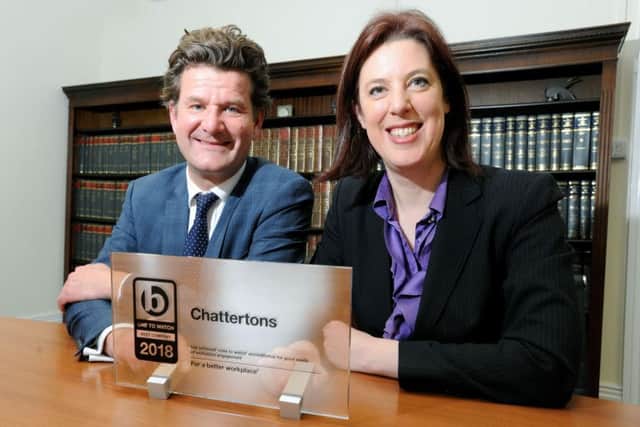 Edward Conway, Chattertons chief executive officer and HR director, Liz Tomlinson with the 'One to Watch' award. EMN-181104-120047001
