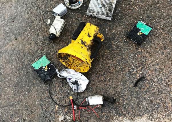 The remains of electrical items which almost started a blaze in a Â£169,000 bin lorry.