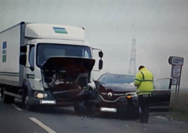The collision between a lorry and car on the A153 at the turn off for Leasingham. Photo: Liz Waters EMN-181204-140751001