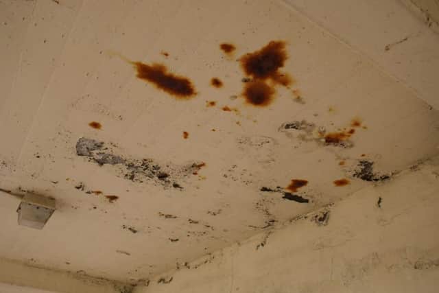 Part of the area that is rusting.