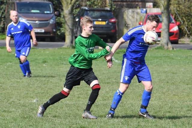 Fishtoft (blue) v Coningsby (green). Kev Parker (blue), Sam Strokes (green)