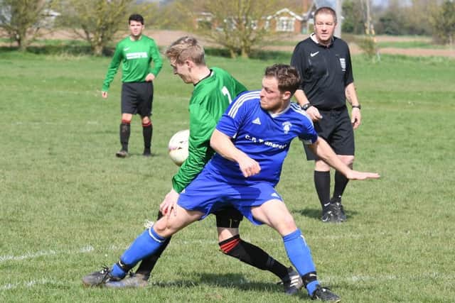 Fishtoft (blue) v Coningsby (green). Kev Parker (blue), Sam Strokes (green)