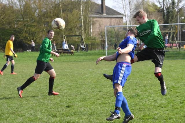 Fishtoft (blue) v Coningsby (green). Kev Parker (blue), Sam Strokes (green)