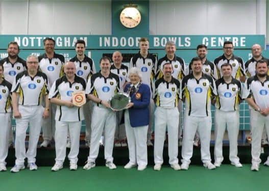 Lincolnshire team members celebrate their victory.