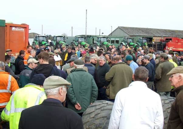 Crowds at the dispersal sale which saw 400 lots in the auction. EMN-180416-154018001